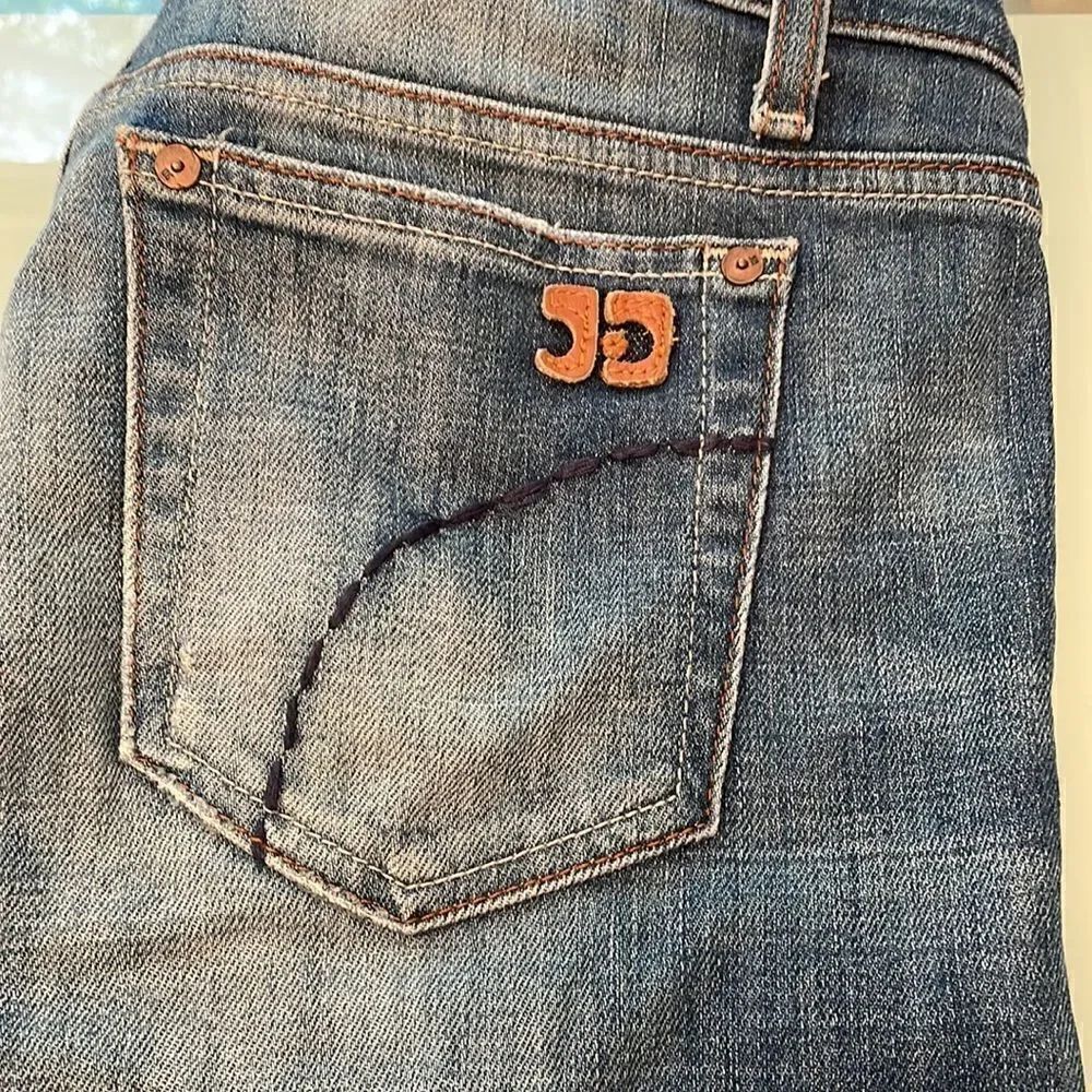 Joe’s jeans 27 socialslite faded Distressed on the bottom of both legs .